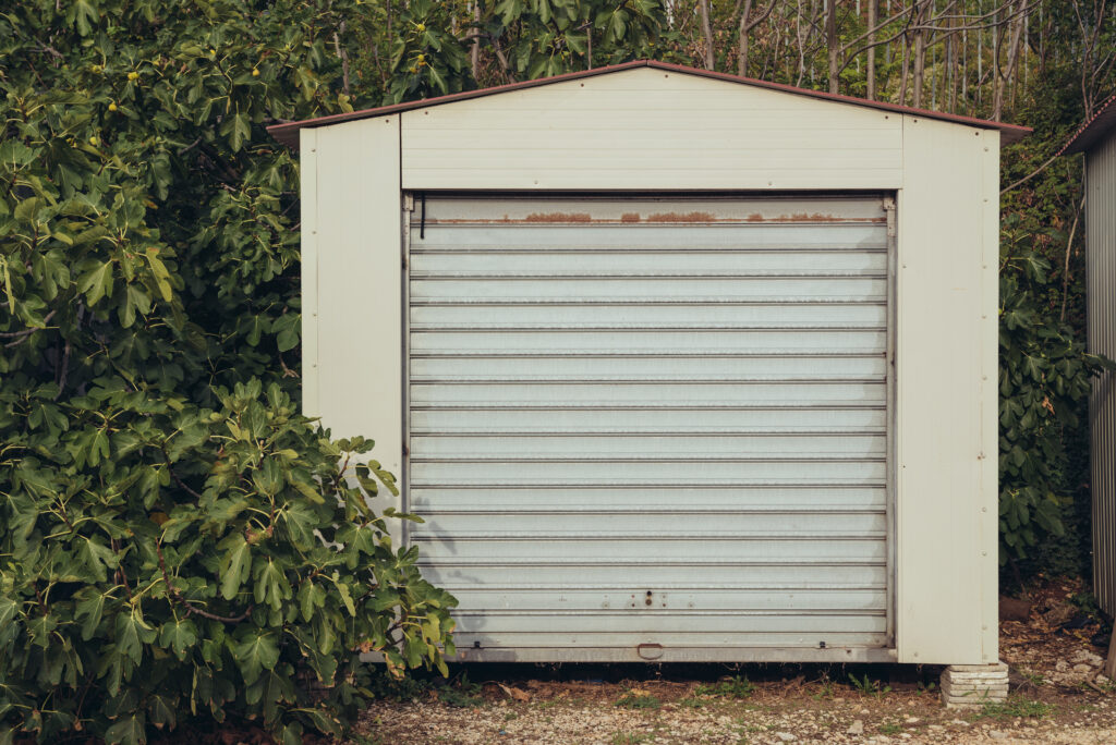 Top 7 Signs You Need a New Residential Garage Door Installation in Texas (And Not Just a Repair) 3 Alibott Garage Doors Co. - old garage doors needing to have residential garage door installation